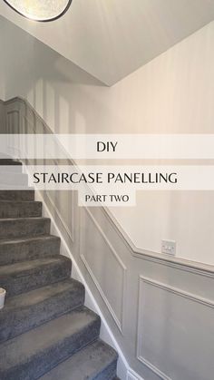 stairs with the words diy staircase paneling part two