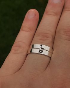 "Matching sun and moon best friend rings, match with your bestie with this adorable dainty ring set. DETAILS: -Two Matching Rings -Each ring is hand stamped -Ring is Sterling Silver -4mm in thickness You will receive two hand-stamped sterling silver rings filled with a black enamel finish. **Every item is handmade, this means that each will be unique and may not look EXACTLY like the picture, but it will look very similar ➡ORDER PROBLEMS If there are any problems with your order please contact m Adjustable Symbolic Stackable Rings As Gift, Adjustable Symbolic Stackable Rings For Gift, White Rings With Sun And Moon Design As Gift, Adjustable Sun And Moon Design Promise Rings, Celestial Style Adjustable Stackable Rings For Anniversary, Open Ring With Sun And Moon Design For Gift, Sun And Moon Design Open Ring For Gift, Sun And Moon Design Open Ring As Gift, Minimalist Sun And Moon Design Rings For Anniversary