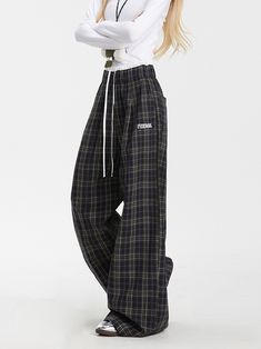 Step up your fashion game with these uniquely designed plaid pants. Featuring a double waistband for added style, these pants provide ultimate comfort with an elastic and drawstring waist. The intricate plaid pattern runs throughout the entire piece, while the embroidered letter decoration on one leg adds a touch of personality. With a straight-leg fit, these pants are both versatile and trendy. Perfect for any casual outing or a chic day at work, these pants are a must-have addition to your war Blue Stripes Pattern, Steampunk Fashion Male, Pattern Pants, Gothic Skirts, Letter Decoration, Skirt Socks, Collar Sweater, Plaid Pants, Pink Plaid