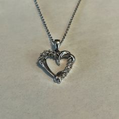 Ben Bridge, 14k High Polish White Gold, Diamond Open Heart, 18” White Gold Chain Necklace. There Are Eleven, Prong Set, Round Diamonds. Adjustable Chain Length 17.25 - 18.50”. Spring Ring Clasp Closure. Heart Is 15.9mm X 16.3mm. Very Lightly Worn And Loved. No Scratches. Like New. In Top Condition. Free Shipping Formal Heart Charm Jewelry With Heart Pendant, Formal Heart Pendant Jewelry With Heart Charm, Formal Diamond White Necklace With Heart Charm, Elegant White Gold Heart Charm Necklace, White Heart Charm Necklace For Formal Occasions, Formal Heart Cut Necklace For Mother's Day, Formal White Double Heart Necklace, Formal Diamond White Heart Necklace In Sterling Silver, Fine Jewelry With Heart Shaped Diamond Cut