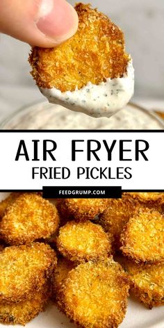 air fryer fried pickles on a white plate with dipping sauce in the middle