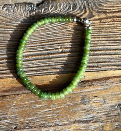 Canadian Jade Bead Bracelet with a magnetic clasp. Jade Beads are approximately 5mm, bracelet measures 7.5" Jade Bead Bracelet, Jade Charm, Jade Bangle, Jade Earrings, Jade Ring, Jade Bracelet, Jade Carving, Jade Jewelry, Jade Beads