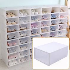 a white shoe rack filled with lots of clear bins next to a wooden chair