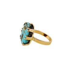 One of a kind Magic!Oval Persian Turquoise ring set in 14K yellow gold. Ring size 8.5.--Our Persian turquoise is hand-picked by Kris and Whealan from Top Turquoise Inc. Turquoise is an ancient, treasured stone that has been fashioned over centuries as a sign of protection for warriors and nobility. The turquoise color is attributed to the percentage of iron or copper in its composition. The more green the turquoise, the more iron and the more blue in color, the more copper. May you wear this protective stone as a symbol of wisdom, tranquility, good fortune and hope.Please refer to our Sizing/Care page for cleaning information. Unique Yellow Gold Oval Turquoise Ring, Antique Turquoise Gemstone Ring, Oval Turquoise Emerald Ring For Collectors, Oval Gold Turquoise Ring Fine Jewelry, Spiritual Oval Turquoise Gemstone Ring, Spiritual Oval Turquoise Ring With Natural Stones, Gold Turquoise Ring With Oval Cabochon, Gold Turquoise Ring With Large Stone As Gift, Antique Yellow Gold Turquoise Ring Gift