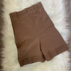 Transform Your Silhouette With These Stunning Shorts Designed To Be Worn Under Any Clothes. A Blend Of Fabrics And Seams Will Give You A Shapely, Sculpted Look From Every Angle! -Product Details Ideal For Daily Use Butt Lifter Non-Slip Lace At The Waist Non-Slip Lace On Thighs Colombian Made Inner Soft Spandex Fabric Outer High-Compression Mesh Fabric Https://Damisat.Com/ Brown Loungewear Bottoms With Built-in Shorts, Brown Bottoms With Built-in Shorts For Loungewear, Loungewear Bottoms With Built-in Shorts In Brown, Fitted Brown Shapewear Bottoms, Fitted Shorts With Short Inseam For Daywear, Fitted Seamless Brown Bottoms, Fitted Brown Bottoms With Short Inseam, Daywear Short Length Stretch Shapewear, Solid Color Shapewear With Built-in Shorts For Loungewear