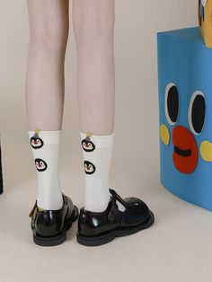 Embrace playful charm with our Cartoon Penguin Striped Socks. Featuring adorable penguin motifs nestled among classic stripes, these socks add a touch of whimsy to your outfit. Crafted from soft and breathable material, they provide all-day comfort and style. Whether you're lounging at home or stepping out for a casual day, these socks are the perfect accessory to showcase your love for penguins. Treat yourself to the cuteness of our Cartoon Penguin Striped Socks and add a fun flair to your sock Cartoon Penguin, Striped Socks, Cute Penguins, Floral Color, Vacation Style, Stepping Out, Colorful Boho, Dress Accessories, Everyday Look