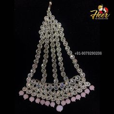 This bridal set is made up with rodium silver polish and gives up an excellent royal look. It comes with Choker, necklace, long haar, earrings, mathapati, Hath Panja, passa. For more designs or any query. Contact us : +91-9079290206 Luxury Silver Bridal Necklace For Ceremonial Occasions, Traditional White Sterling Silver Bridal Necklace, Silver Necklace With Stone Work For Ceremonial Occasion, Silver Necklaces With Stone Work For Ceremonial Occasions, Silver Ceremonial Necklace With Stone Work, Luxury Silver Bridal Necklace For Festive Season, Silver Hallmarked Kundan Necklace, Ceremonial Silver Hand Set Bridal Necklace, Ceremonial Hand Set Silver Bridal Necklace