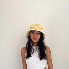 ✮ This checkered bucket hat was designed with the desire to create a funny, young and free street style. ✮ Goes with any outfit and looks great whatever the season. ✮ Like my other products, this checkered bucket hat is also carefully knitted. ✮ Crochet cream and yellow checkered bucket hat is completely handmade and is 100% cotton.  ✮ Excellent gift checkered bucket hat for men and women. ✮✮ If you want to mix different colors and design a special hat for yourself, you can choose a color from the color scale and let me know. --- Details --- ✮ 100% cotton. ✮ Sun protection, packable. 💐 Care instructions 💐 ✮ Hand washable. ✮ You can iron it with a steam iron.   Note💌 Not sure what hat size you are? No problem it's easy: Just take a measuring tape measure just above your ears around your Trendy Crochet Hat For Spring, Trendy Crochet Hat For Spring, One Size, Trendy One Size Crochet Hat For Spring, Retro Crochet Cap For Summer, Trendy White Crochet Hat, Trendy White Crochet Hat, One Size Fits Most, Trendy White Crochet Hat One Size Fits Most, Trendy One-size Crochet Hat, Retro Yellow Bucket Hat For Spring