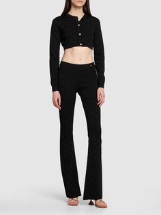 Front button closure. Ribbed collar, cuffs and hem. Logo details. All over pattern placement may vary. Model is wearing a size40 Knit Crop Cardigan, Versace Logo, Crop Cardigan, All Over Pattern, Cardigan Crop, Flared Pants, Jacquard Knit, Jeans Jumpsuit, Knit Crop