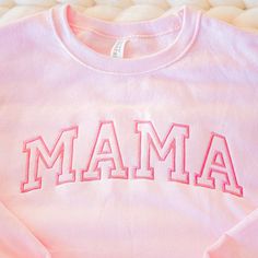 Our Custom Embroidered MAMA Sweatshirts are so cozy and cute! Embroidered in our shop in East Tennessee, you can choose between 20 thread colors to customize your MAMA Embroidered Sweatshirt. These MAMA Sweatshirts are embroidered as a full chest design, approximately 12" wide. With hundreds of color combinations, you can create your perfect MAMA Embroidered Sweatshirt! ✨ DETAILS ✨ ✧ Material: 50% Cotton, 50% Polyester ✧ Fit: Unisex ✧ Brand: Jerzees ✧ Professionally Embroidered in our shop in East Tennessee ✧ 145,000 + Embroidered Monograms of Experience ✨ MAMA SWEATSHIRTS & THREAD COLORS PICTURED ✨ ✧ Classic Pink MAMA Sweatshirt - Flamingo Thread  ✧ Black MAMA Sweatshirt - Ballerina Thread (Looks White in Pics) ✨ HOW TO ORDER ✨ 1.) From the drop down menu, please select the size and color Embroidered Monogram, Mama Sweatshirt, Embroidered Sweatshirts, Monogram Gifts, Bubble Gum, Gifts For New Moms, Colorful Pictures, New Moms, Color Combinations