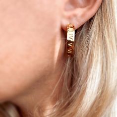 High-quality Roman numeral C hoop earrings, free of harsh chemicals like nickel, lead, and cadmium. Water-resistant and comparable to fine gold, Donna Italiana's jewelry is your path to fashion and premium style. 25 mm diameter x 5mm wide Polished C Hoop with roman numerals inscription Push back closure Rose Gold Metal Hoop Earrings For Anniversary, Elegant Personalized Hoop Earrings For Everyday, Metal Huggie Earrings For Anniversary, Personalized Round Hoop Earrings For Everyday, Personalized Everyday Hoop Earrings, Personalized Everyday Hoop Jewelry, Cadmium-free Small Hoop Jewelry For Anniversary, Boutique Collection, Roman Numeral