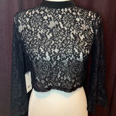 Beautiful Lace Cropped Topper, Perfect To Wear Over A Dress For More Coverage. Was Part Of Set By Ali & Jay Dress “Dim All The Lights”. New And Unworn With Tags Still Attached, But Does Not Include Dress. Size Small, Shown On Size 6 Dress Form. Black Long Sleeve Lace Top For Fall, Black Long Sleeve Lace Top For Evening, Spring Cropped Lace Top For Party, Spring Cropped Lace Top For Night Out, Cropped Lace Top For Spring Party, Spring Night Out Cropped Lace Top, Black Long Sleeve Lace Top For Party, Lace Trim Cropped Tops For Evening, Cropped Lace Trim Tops For Evening