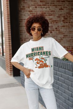 Whether you're cheering on your team from the sidelines or enjoying the festivities at the tailgate, our Spring Collection Game Day Essentials are sure to keep you looking and feeling fabulous all season long. Join the fashion game and make every game day unforgettable! From The Sidelines, Michigan State Spartans, Oversized Crewneck, University Of Miami, Gameday Outfit, Michigan State, Gaming Clothes, Spring Collection, Game Day