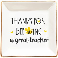 a white and gold plate with the words thanks for bee ing a great teacher