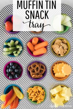 the muffin tin snack tray is filled with different types of fruit and veggies