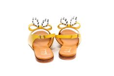 "Handmade yellow flat leather slingback sandals, embellished with double bow and easy to put they are must have pair of shoes for every summer yet to come. They will simply add a kick to any summer outfit you choose. Wedding or not here they come. The cushioned insole will make them only inseparable part of everyday choice. They're designed to look stylish enough to take you \"from day to night. Full leather outer, interior and sole. DETAILS: Full leather upper, lining and sole Pink napa leather Chic Yellow Slingback Sandals For Spring, Elegant Bow Slingback Sandals For Summer, Yellow Slingback Sandals With Removable Insole, Yellow Closed Toe Slingback Sandals For Summer, Closed Toe Sandals With Bow For Summer, Spring Bow Strap Sandals With Round Toe, Leather Bow Sandals With Ankle Strap, Yellow Low Heel Sandals For Summer, Chic Bow Slingback Sandals For Spring