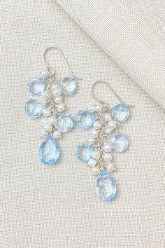 Blue Topaz Bridal Earrings with Pearls in Sterling Silver Blue Topaz Dangle Jewelry For Wedding, Light Blue Sterling Silver Earrings For Wedding, Blue Briolette Earrings For Wedding, Handmade Blue Drop Bridal Earrings, Blue Topaz Teardrop Earrings For Wedding, Light Blue Sterling Silver Wedding Earrings, Teardrop Blue Topaz Earrings For Wedding, Handmade Blue Dangle Pearl Earrings, Elegant Blue Faceted Beads Earrings