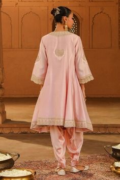 Blush pink short anarkali, adorned with kashmiri tilla, parsi gara embroidery and highlighted with basra moti. Paired with a dogri salwar and embroidered border dupatta. - Aza Fashions Pink Traditional Churidar For Transitional Season, Transitional Pink Churidar With Traditional Drape, Pink Bollywood Style Kurta For Reception, Pink Churidar For Reception, Pink Salwar Kameez For Reception In Transitional Season, Reception Churidar With Pallu, Pink Kurta For Reception And Transitional Season, Pink Kurta With Pallu For Reception, Pink Reception Kurta With Pallu