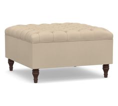 the foot stool is upholstered and ready to be used as an ottoman or bed