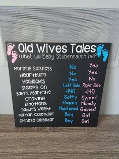 an old wives tales sign with baby footprints on it