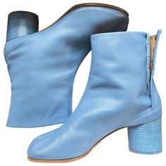 Maison Martin Margiela Women's Tabs Mid Heel Boot (Cornflower Blue) Buttery Soft Calfskin Original Price: 1090usd Asking Price: 750usd (Will Consider Reasonable Offer) Heel Height: 2in No Surface Scratch On Any Part Of Visible Shoe Material Worn Once, See Photo Of Soles Original Box & Shoe Packaging Very Good Condition (A Second-Hand Item That Is Hardly Worn And Has Been Very Well Maintained. See Photos) Spring Calf Leather Heeled Boots With Leather Sole, Spring Heeled Boots With Leather Sole And Calf Leather, Spring Heeled Boots With Calf Leather, Shoe Packaging, Maison Martin Margiela Shoes, Pony Style, Tabi Boots, Mid Heel Boots, Margiela Tabi