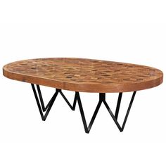 a wooden table with black metal legs and an oval design on the top is shown