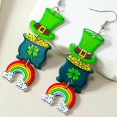 St. Patrick’s Day Dangle Earrings For Sale! These Earrings Are Absolutely Adorable! They Are New, Have Never Been Worn, And They Are From My Boutique. They Are Made For Pierced Ears, They Are Made Out Of An Acrylic Material, And Are A Little Over 3 Inches Tall And A Little Over 1/2 Inch Wide. Such Cute Earrings To Add To Your Jewelry Collection! Green Dangle Earrings With Fun Style, Green Fun Drop Earrings, Fun Green Drop Earrings, Clay Earrings St Patricks Day, Saint Patricks Earrings, Lgbtq Earrings, St Patrick’s Earrings, Shamrock Earrings, Earrings For Sale