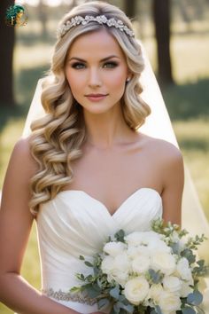 a beautiful blonde bride holding a bouquet of white roses and greenery in her hand