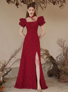 Rare and ravishing, this red lace prom dress is designed to make you feel like a queen. The intricate lace detailing, combined with the unique puff sleeves, offers a blend of classic elegance and modern style. The fitted bodice hugs your curves in all the right places, while the front slit provides a hint of allure and sophistication. This dress is perfect for those who want to make a bold fashion statement at their prom or any formal event. The high-quality lace fabric is both soft and durable, ensuring maximum comfort and longevity. The deep red color is striking and elegant, making this gown a standout piece in any setting. With its impeccable design and attention to detail, this dress is sure to leave a lasting impression. Backless Prom Dress, Red Lace Prom Dress, Shy Girl, Yellow Satin, Lace Prom Dress, Shy Girls, Backless Prom Dresses, Burgundy Lace, Deep Red Color