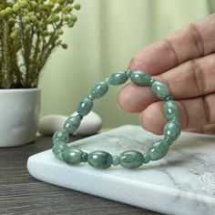 🌅Jade bead bracelet: Also called the buddha bead, symbol the spirit of Buddhism, suitable for the people who believe Buddhism or have a heart for being kind 🍀JadeousJade: An Etsy StarSeller of natural Jadeite Jade jewelry for your daily mix and match 🌟Item Details: * 100% AUTHENTIC: Grade A untreated natural Jadeite Jade bracelet * DETAIL HANDCRAFTED: Handcrafted in detail & finely polished * PROPERTY: Bring Protection, Safe and Calm * INNER LENGTH: 15 cm with elastic string (fits 13-15cm wrist size) * DIMENSION of LuLuTong/Barrel Bead: 10mm x 7mm each * WEIGHT: 14g each (approx.) 💝We hope you can find a piece of jade jewelry that resonates with your mind and soul. Or send someone a gift with meaning and blessing! 🌠Ship from Hong Kong with fast and reliable shipping. 🛠️Customizations Jadeite Jewelry, Buddha Beads, Bangle Jewelry, China Style, Jewelry Minimalist, Jade Bracelet, Silver Engraving, Jade Jewelry, Jade Beads