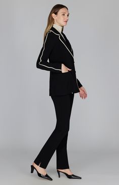 The easy effortlessness of a double breasted boyfriend blazer with a slightly shaped silhouette through the waist and dynamic contrast bias trim. This jacket is great as a stand alone piece or as part of an elevated suit. This jacket is unlined and has functional pockets. Classic Tailored Blazer With Contrast Trim, Elegant Workwear Blazer With Contrast Trim, Elegant Blazer With Contrast Trim For Work, Classic Tailored Outerwear With Contrast Trim, Fitted Blazer With Contrast Trim For Work, Classic Blazer With Contrast Trim For Fall, Fall Blazer With Contrast Trim For Work, Classic Fall Blazer With Contrast Trim, Fitted Blazer With Contrast Trim For Office