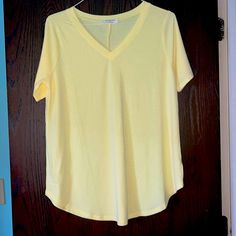 Xl Brand New Pastel Yellow V Neck Tshirt Never Worn Perfect Condition Yellow V-neck Top For Loungewear, V Neck Tshirt, Pastel Yellow, Tshirt Colors, Top Brands, Tops & Tees, Pastel, Womens Tops, V Neck