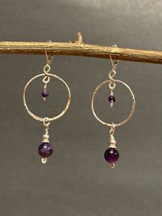 Purple Amethyst sterling silver Wire Wrapped, handforged Hammered Hoop, Silver beads and daisies, hoop dangle chandelier Earrings.  Minimalist jewelry design. The deep rich purple amethyst round beads are impressive. Great gift idea. Total measurement length 2 3/4 inches including sterling silver lever back earring wire, width 1 inch wide and drop length is 2 inches long. Amethyst Jewelry Earrings, Handmade Sterling Silver Round Chandelier Earrings, Handmade Silver Hoop Chandelier Earrings, Amethyst Chandelier, Hoop Chandelier, Making Jewelry For Beginners, Wire Earrings Handmade, Earring Wire, Rich Purple