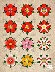 a bunch of flowers that are on a piece of paper