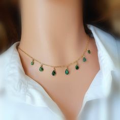 "Genuine Emerald Necklace, One Of Kind Necklace, May Birthstone Handcrafted choker necklace featuring green Zambian emerald drops, perfect for layering or wearing on its own for a minimalist look. Genuine Zambian emerald plain drops 5-6mm topped with gold filled beads 2mm. Available in 925 sterling silver OR 14k yellow gold fill OR 14k rose gold fill. The necklace is available 14-18'' long. Comes wrapped in a gift box, securely packaged for shipping. Matching Zambian emerald earrings could be fo Emerald Choker, Drops Necklace, Gold Silver Necklace, Dainty Necklace Layered, Choker Necklace Gold, Necklace Emerald, Zambian Emerald, Bib Necklaces, Gold Choker Necklace