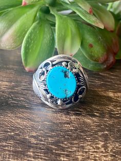 Navajo Made Kingman Turquoise Sterling Silver Ring Size 11. It measures just over 1 inch long and just over 3/4 of an inch wide. Signed by the artist and stamped sterling silver. Thank you for checking out my store, if you have any questions please contact me!! Exported By ExportYourStore :) SKU:40117499953237_6569* Engraved Oval Turquoise Ring In Sterling Silver, Western Oval Turquoise Ring With Inlay, Western Style Oval Turquoise Ring With Inlay, Adjustable Engraved Turquoise Ring, Oval Turquoise Engraved Ring In Sterling Silver, Western Style Oval Turquoise Inlay Ring, Southwestern Style Engraved Turquoise Ring As Gift, Artisan Stamped Turquoise Ring, Western Style Oval Engraved Jewelry