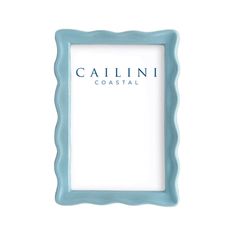 a blue frame sitting on top of a white wall next to a sign that says callini