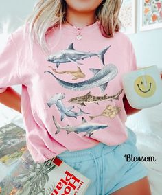 This Comfort Colors shark shirt is perfect for your everyday style or your next beach day. The soft-washed, garment-dyed fabric brings extra coziness to your wardrobe, while the relaxed fit makes it an excellent daily choice! 🤩 Tip: THESE RUN TRUE TO SIZE. If you want an oversized look, size up 2-3 sizes. 😉 ✅ Shirt Information: Comfort Colors Unisex Shirt - 100% ring-spun cotton - Medium fabric  - Relaxed fit ✅Design Printing Design printed using Direct to Garment (DTG) print technology. ✅ Car Polaroid Shirt, Moon Phases Shirt, California Shirt, Retro Disney, Mickey Mouse Halloween, Disneyland Shirts, Disney World Shirts, Aesthetic Shirts, Disney Shirt