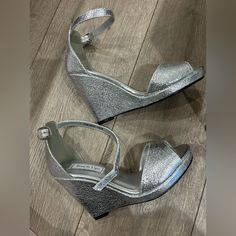 Price Touch Ups Silver Wedge High Heel Sandals 7.5 Nwt Never Worn Sexy/Dressy Very Pretty Open Toe New In Box Evening Closed Toe Wedge Sandals With Heel Loop, Silver Synthetic Wedge Sandals, Silver Wedge Heel Sandals For Party, Party Wedge Sandals With Heel Strap, Party Wedge Sandals With 4-inch Heel, Silver Wedge Heels With 4-inch Heel, Silver Ankle Strap Platform Wedge Sandals, Silver Platform Wedge Sandals With Ankle Strap, Silver Wedge Heel Sandals For Formal Occasions