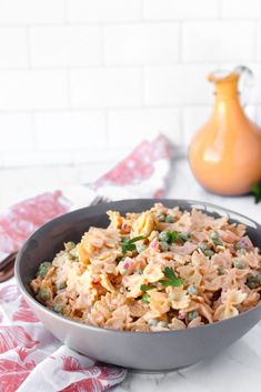 a close up of a bowl of food on a table