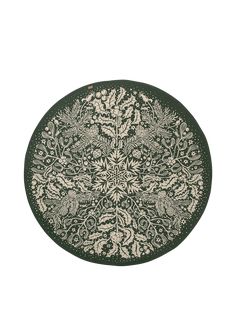 a green and white plate with an intricate design