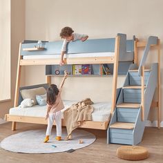 two children are playing on the bunk beds