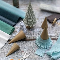 several crafting supplies are laid out on a table