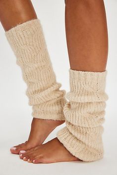 So cool and cozy, these classic legwarmers are featured in a soft knit fabrication and staple silhouette, perfect to pair with anything from a casual slide to a super stylish sneaker. | Snow Bunny Legwarmers by Free People in White Casual Warm Knee-high Socks, Fitted Cable Knit Winter Bottoms, Casual Socks, One Size, Casual One-size Socks, Casual Solid Color Socks One Size, Cozy Winter Bottoms With Ribbed Cuffs, Cozy Knee-high Knit Socks, Winter Soft Knit Bottoms, Fitted Cable Knit Socks