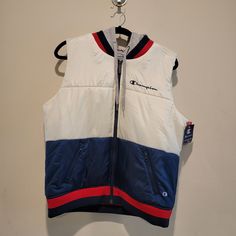 Champion Down Puffer Vest With Grey Layering Hood Red White And Blue Patriotic Jacket Vest Layering Piece Athletics Nwt Stadium Puffer Vest J4380 549707 7+N Chalk White White Vest For Streetwear In Fall, White Fall Streetwear Vest, Sporty White Vest For Streetwear, White Winter Streetwear Vest, White Outdoor Vest For Fall, White Winter Vest For Cold Weather, Vest Layering, Champion Jacket, Jacket Vest