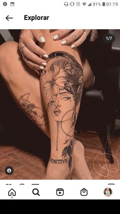 a woman's legs with tattoos on them