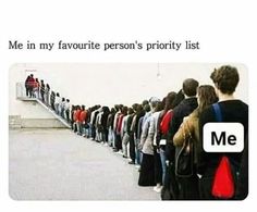 a line of people standing in front of a white wall with the caption me in my favorite person's priority list