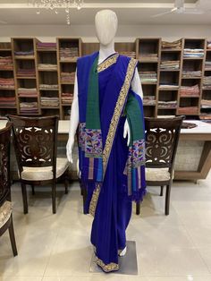 A Marvellous Embroidered Kashmiri Saree, which you can wear at any party or a wedding.- - - - - - - - - - - - - - - - - - - - Product Details- Condition: Brand New- Style: Saree- Embroidery: Kashmiri Tilla Embroidery- Base Colour: Royal Blue- Embroidery Colour: Golden - Care Instructions: Dry Clean OnlyF A B R I CSaree: Pure CrepeBlouse: Pure CrepeF I N I S H- UnstitchedYou can get it stitched locally.- StitchedWant your blouse ready to wear, let us know the style you want and we will stitch it Blue Festive Anarkali Set With Traditional Drape, Festive Blue Anarkali Set With Traditional Drape, Blue Anarkali Set For Festive Occasions, Blue Chanderi Dresses With Cutdana, Blue Unstitched Choli For Transitional Season, Festive Blue Anarkali Set With Pallu, Blue Anarkali Set With Traditional Drape For Festivals, Transitional Blue Raw Silk Lehenga, Blue Anarkali Set With Traditional Drape And Pallu