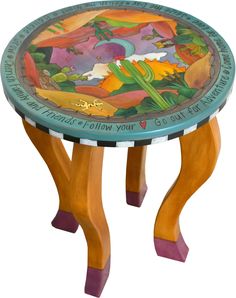 a small wooden table with colorful designs on it