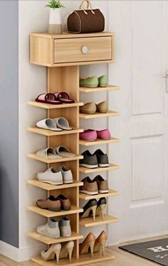 the shoe rack is made from wood and holds many pairs of shoes